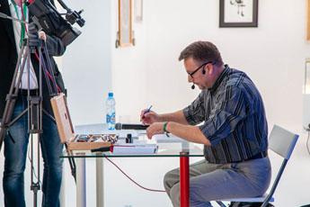 Artem Lebedev, a teacher in the National Calligraphy School, speaks of the training courses for all ages