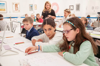Children get exposed to the great art of calligraphy from young age