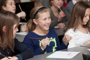 Young enthusiasts of beautiful handwriting Young enthusiasts of beautiful handwriting