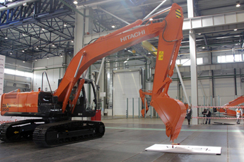 Excavators got to paint hieroglyphs and pour champagne at the factory’s opening near Tver 