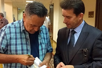Renat Ibragimov is signing his CD to the Contemporary Museum of Calligraphy